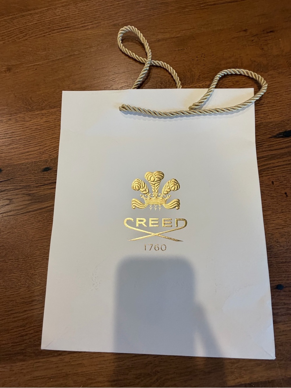 Creed White Shopping Bag with Gold Foil Logo